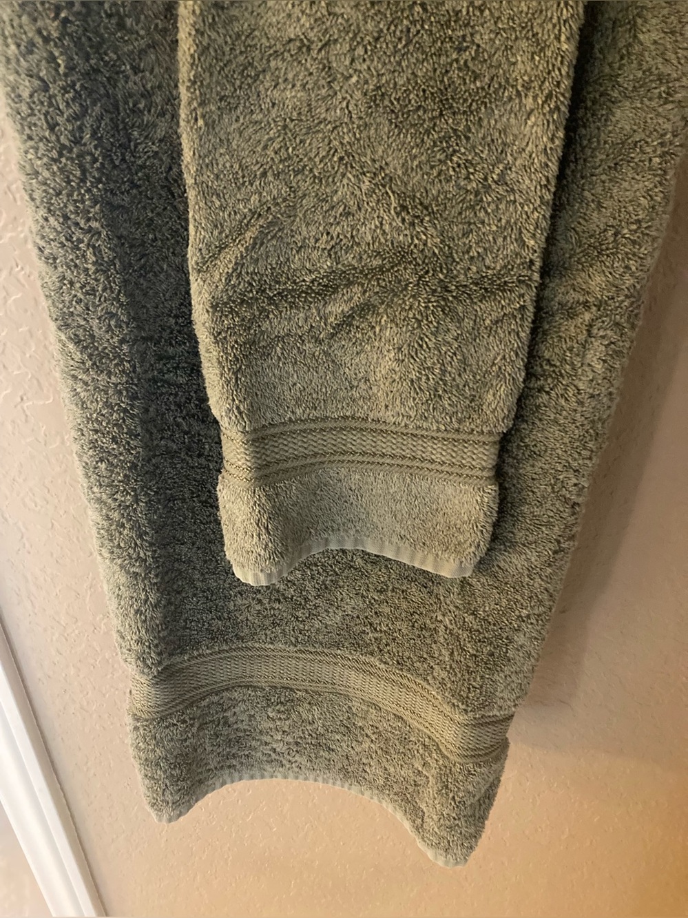 2 Croscill towels, 3 hand towels and 1 bath mat.